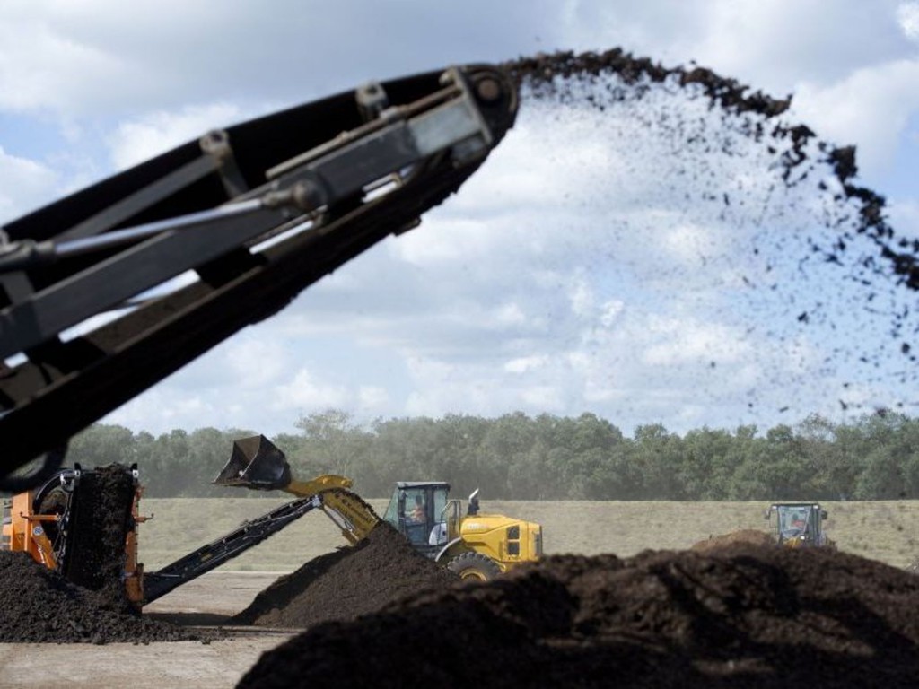 spewing biosolids Machine spewing biosolids